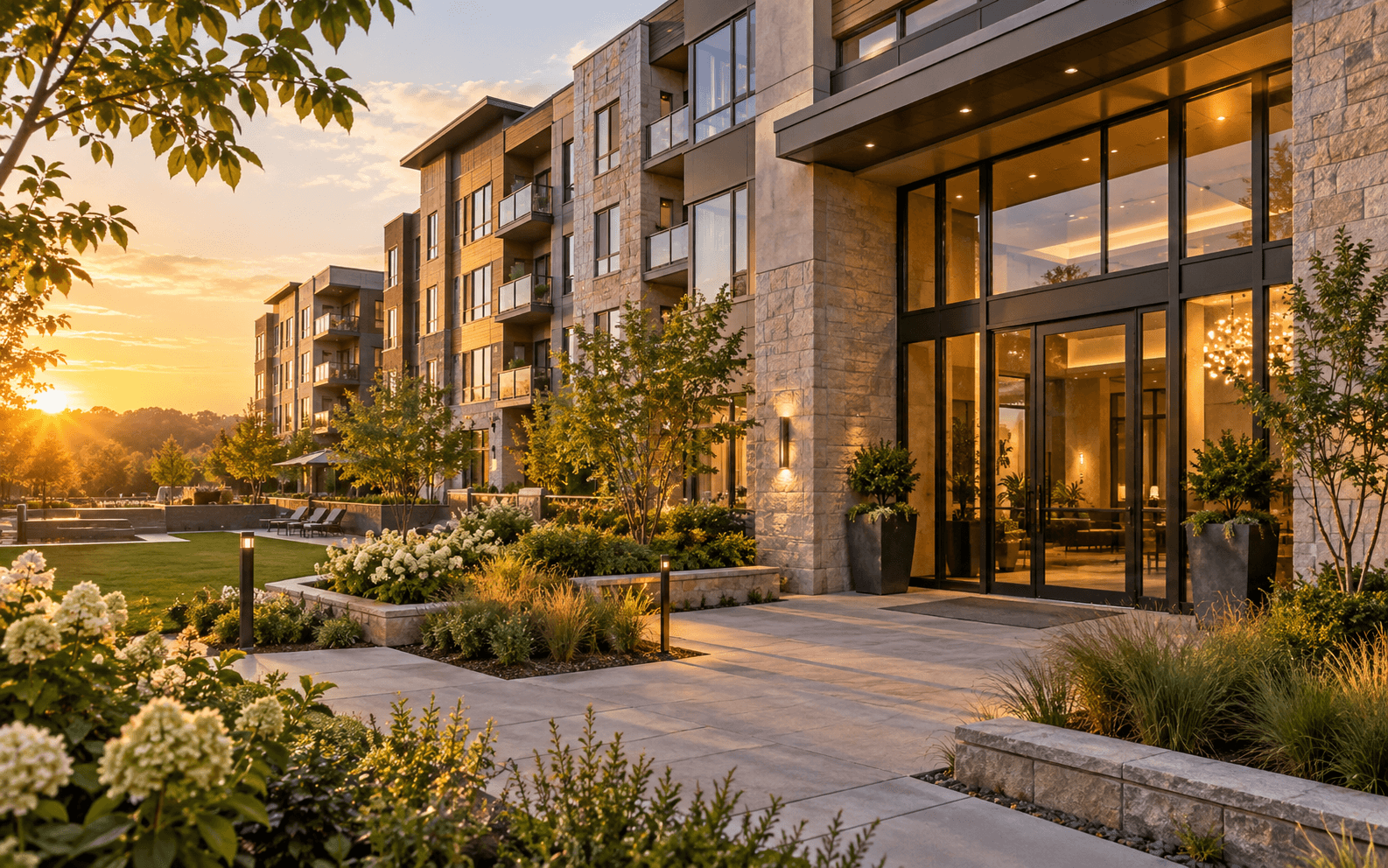Modern multifamily property exterior at golden hour